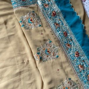 Nude and turquoise georgette sari